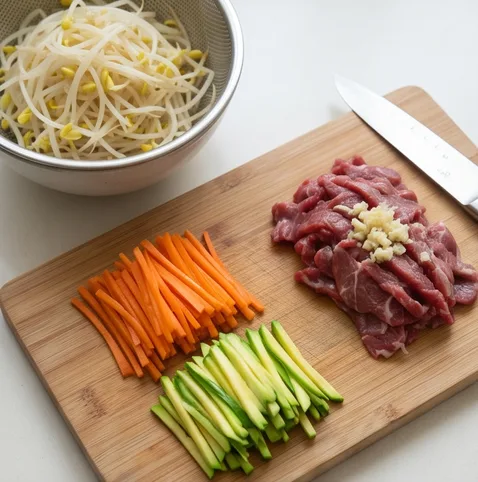 Sogogi Bibimbap (Korean Beef Mixed Rice Bowl) 조리 단계 1 이미지 - Julienne the carrot and zucchini, thinly